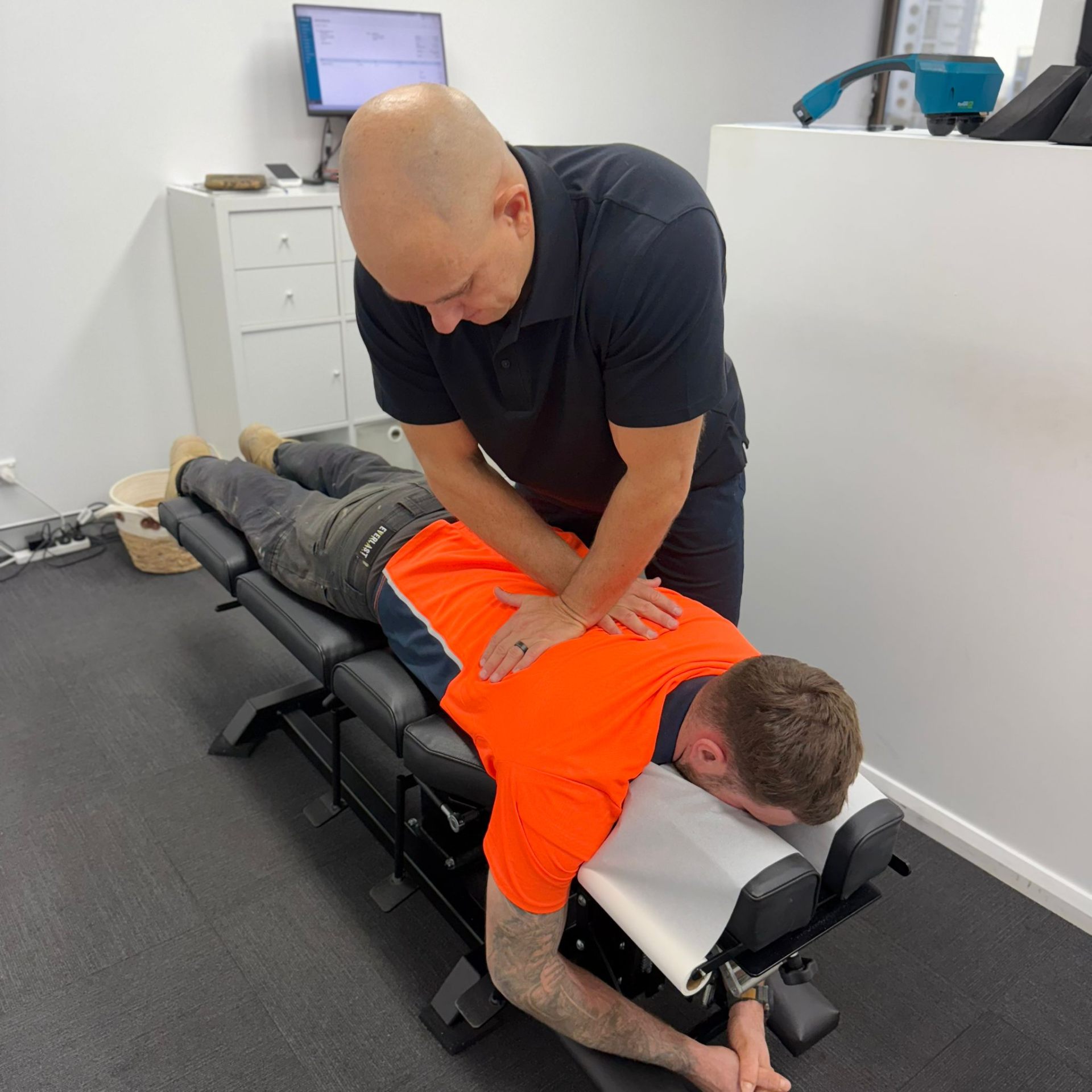 Adjustment on chiro table